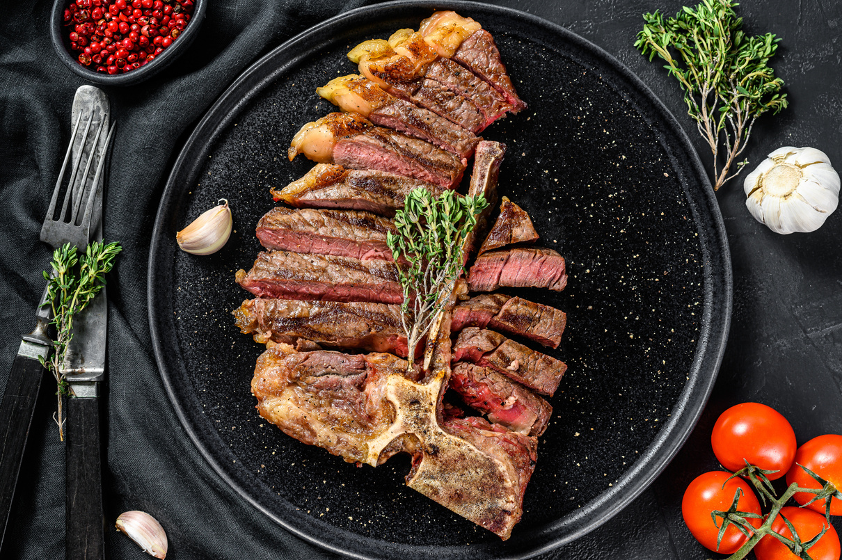 Sliced Grilled Florentine Steak. T-Bone Meat Beef. 